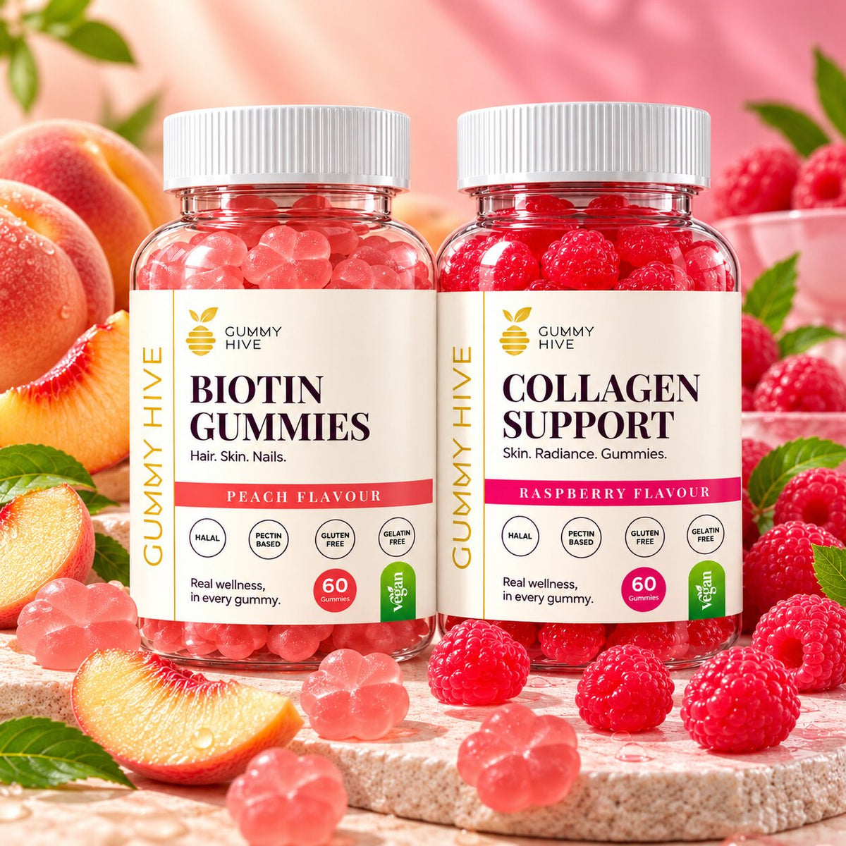 Gummy supplement bottles with white caps: Biotin Peach and Collagen Raspberry